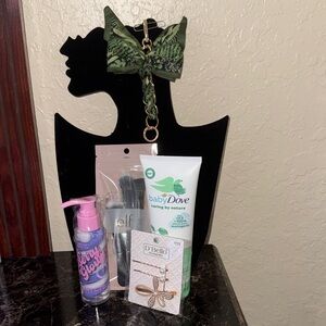 Baby Dove Moisture Cream, Berry Glowy, D’Bello Hair, ELF face brushes, keychain